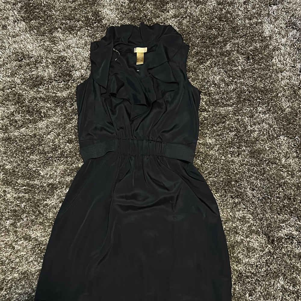 Miss Tina Knowles. Color: Black. Size: L 12/14